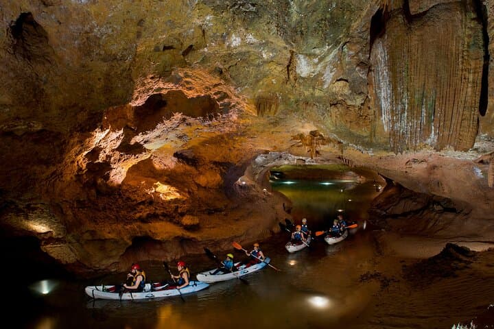 A group speleolokayaking in the interior of the San José caves