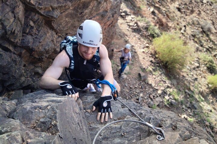 Via Ferrata full equipment gear under supervision of guide