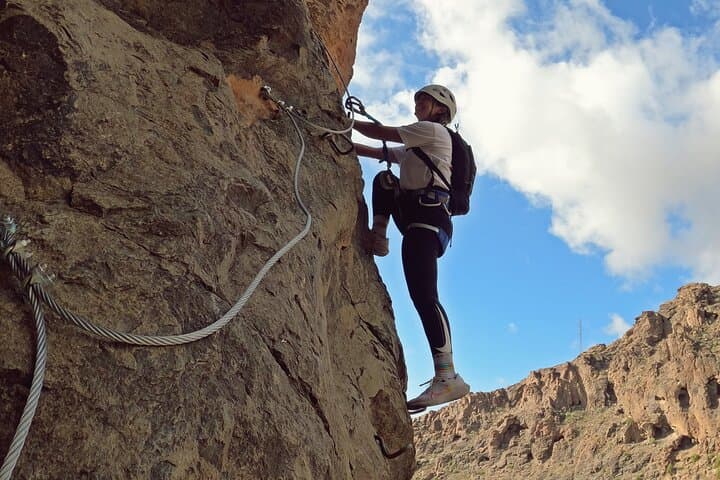 Climbing via ferrata with safe lines and iron steps