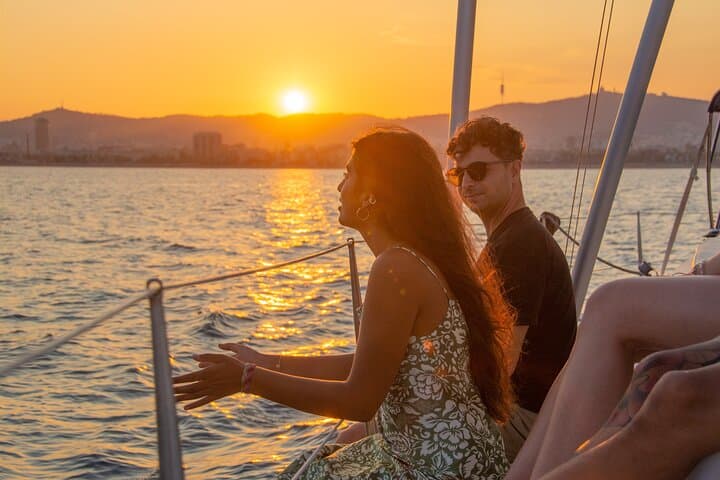Sunset on a Sailboat along the Coast of Barcelona