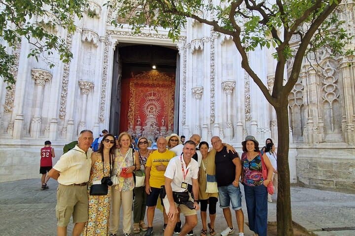 Clients posing with guide Santiago after visiting the Cathedral.