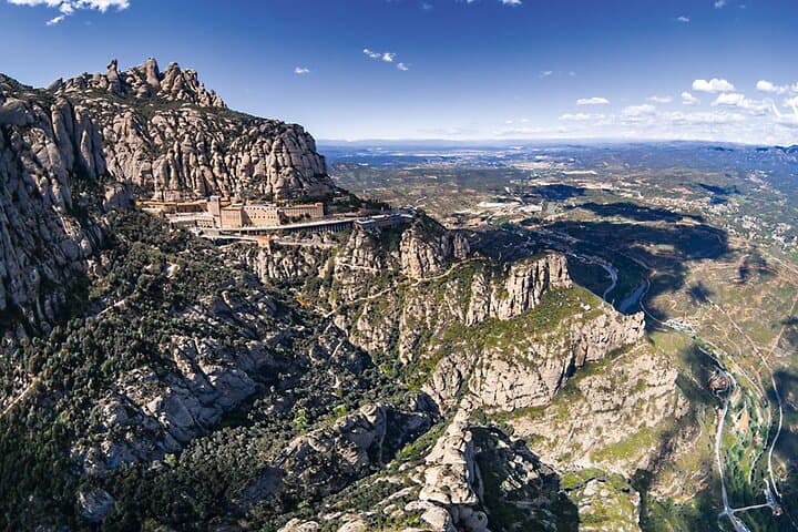 Train Journey from Barcelona Shared Tour in Montserrat + Ebook