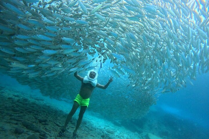 Guests experiencing the feeling of walking on the moon… underwater!