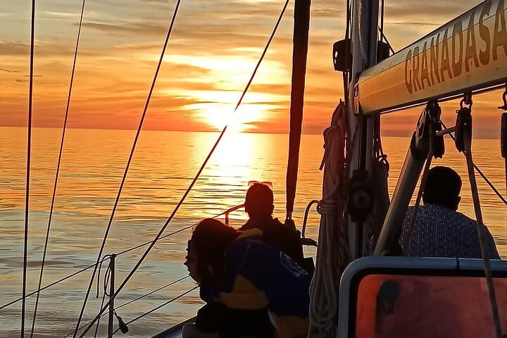 Sailing at sunset along the cliffs of Maro-Compartida