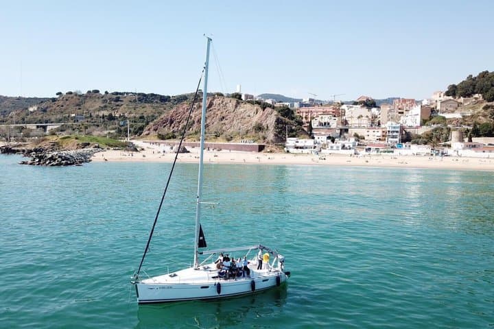 Sailing Boat Trip in Barcelona with Snacks and Drinks