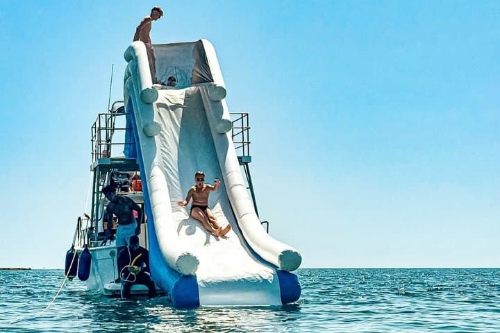 Benalmadena: Private Boat with Slide, Snorkeling and Activities